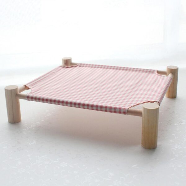 IMG-20250619-WA0037 Purrly Elevated Wooden Cat Bed – Washable Canvas Lounger with Pine Wood Legs (19.6"x19.6")